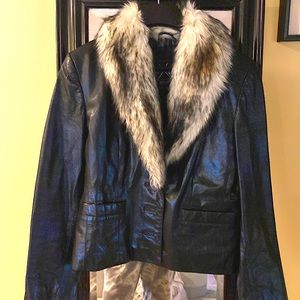 Like new genuine leather jacket with fur collar size Small
